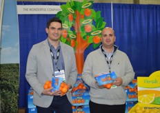 Al Godard and Darren DeFilipppis with the Wonderful Company proudly show Halos mandarins.